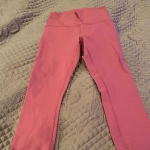Pink lululemon leggings. Size 4. Never worn.